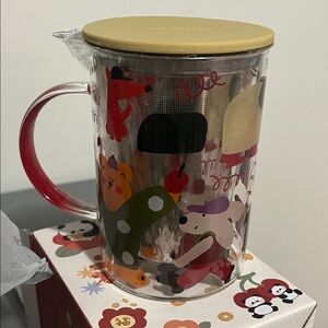 Playful Animal Print Mug with Yellow Lid